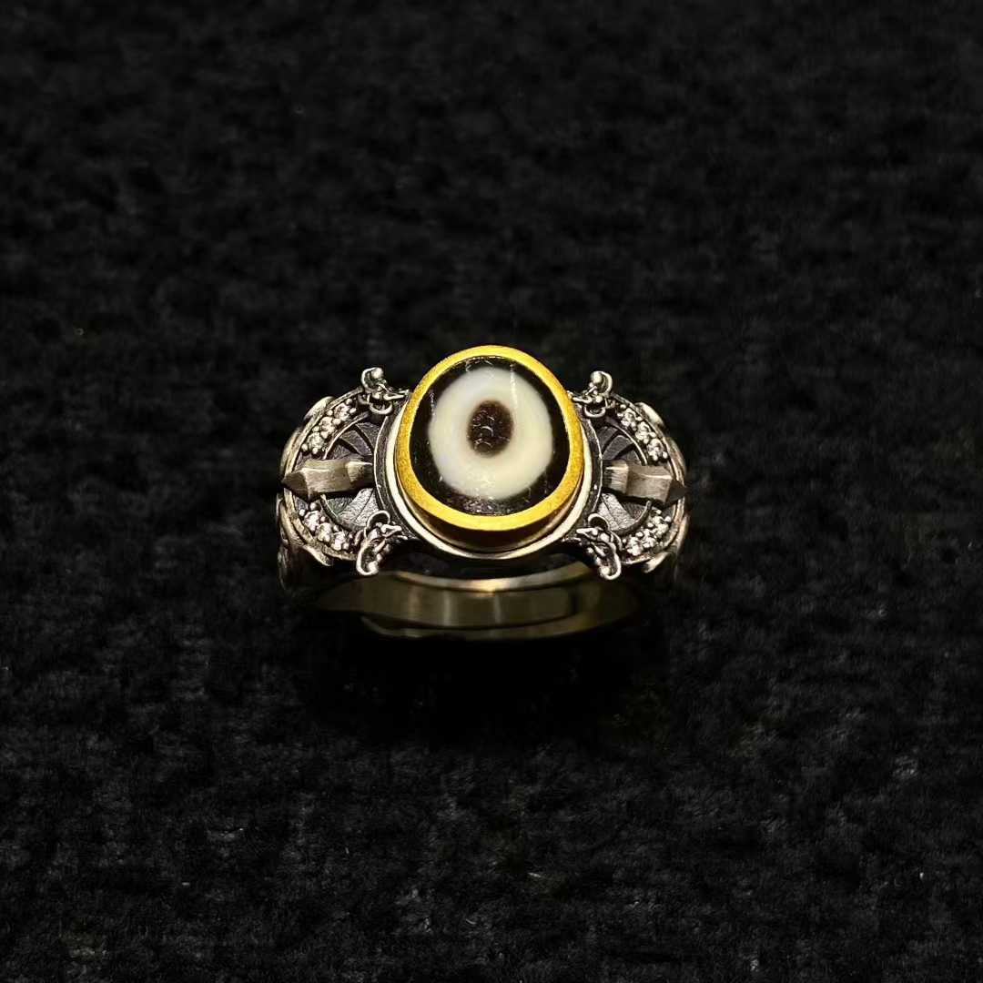 Sacred dorje protection ring in sterling silver represents Tibetan Buddhist jewelry culture, offering spiritual safeguarding in jewelry art.