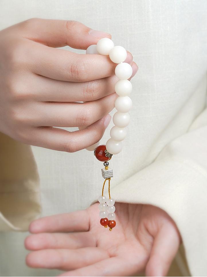 Sacred Bodhi Prayer Beads with agate and lapis lazuli spacers. This jewelry culture creation represents authentic Tibetan Buddhist spiritual traditions.