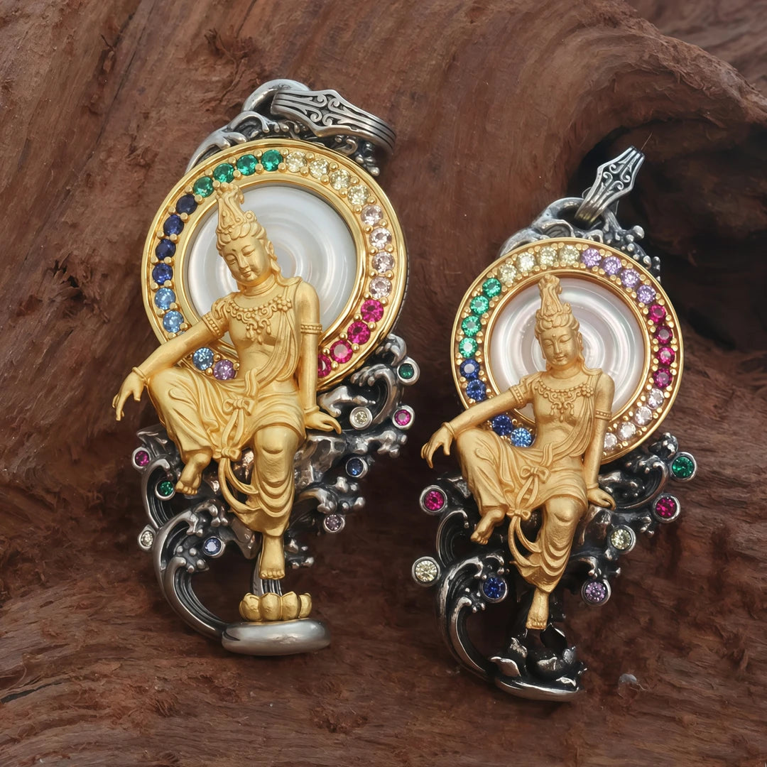 Hand-carved silver Water Moon Guanyin pendant inspired by Tibetan Buddhist jewelry culture, symbolizing compassion and protection.