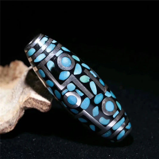 Handcrafted vintage silver necklace featuring nine-eyes symbolism, inspired by Tibetan Buddhist jewelry culture and spiritual jewelry art