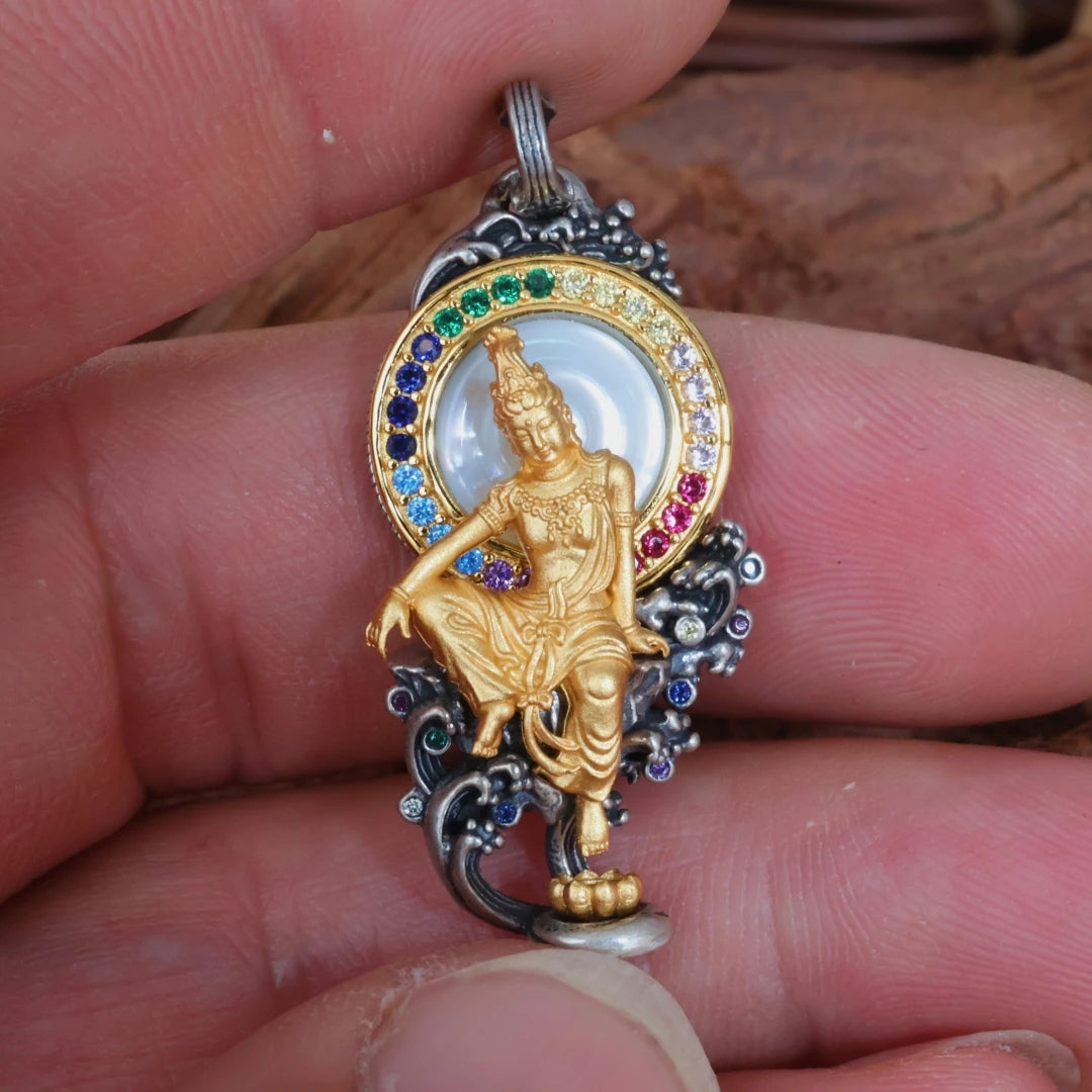 Sacred Water Moon Guanyin silver pendant, handcrafted Tibetan Buddhist jewelry art for meditation and blessings.