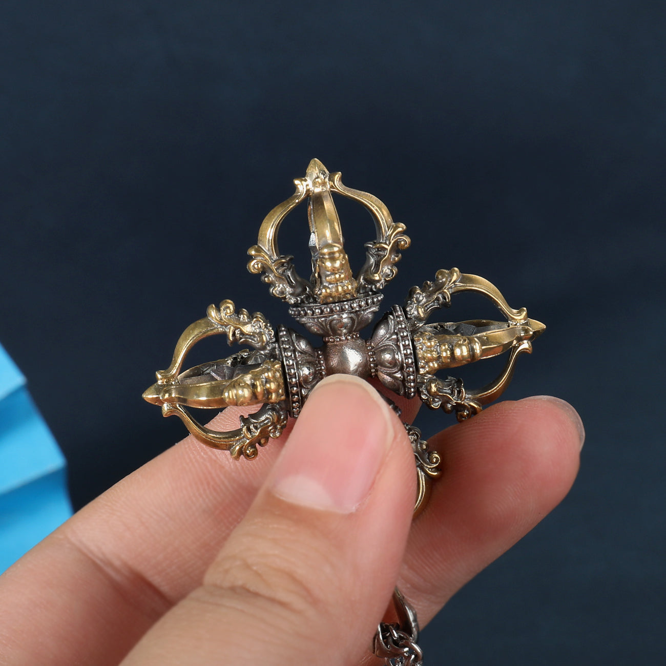 6cm Capricorn Cross Vajra pendant, hand-painted and crafted from brass and white copper, symbolizing wisdom and strength in Tibetan Buddhist jewelry art