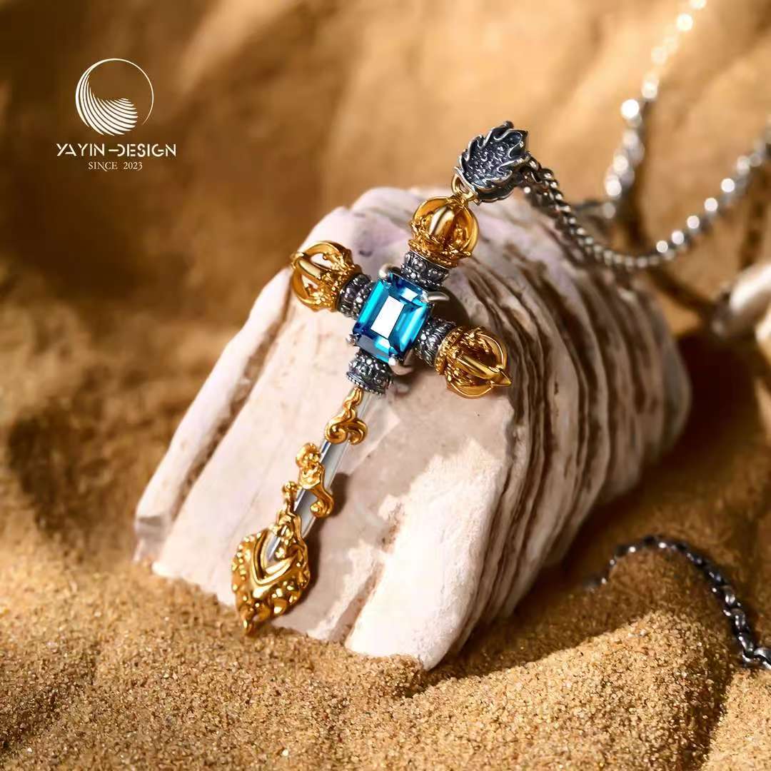 Handcrafted silver Manjushri sword pendant inspired by Tibetan Buddhist jewelry culture, symbolizing wisdom and clarity.