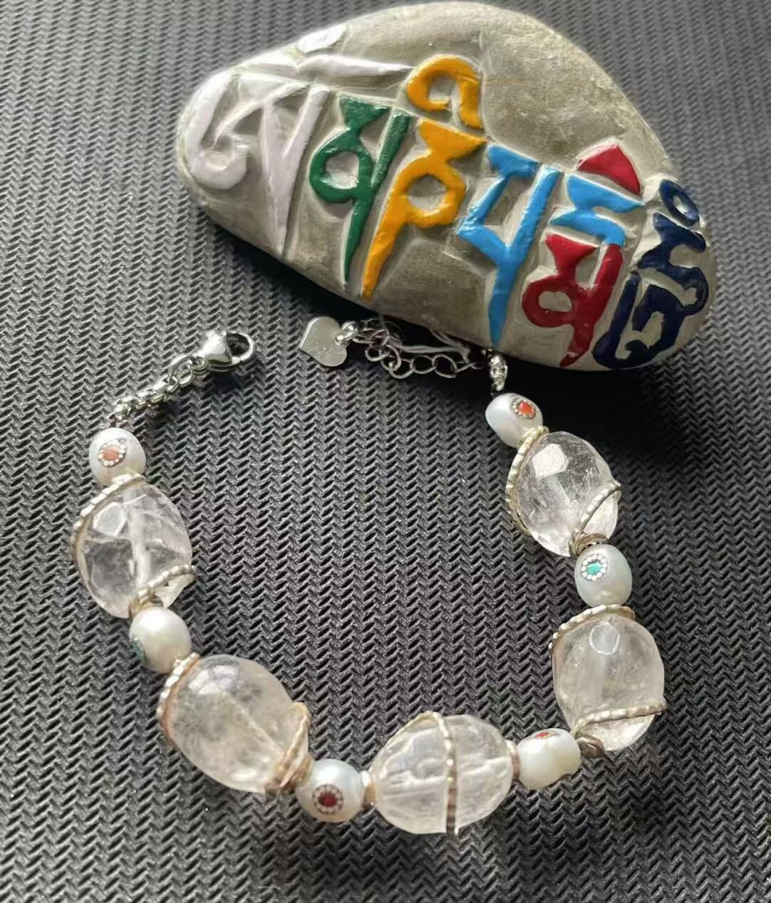 Handcrafted white Water Well Treasure jewelry, combining Tibetan Buddhist jewelry culture with minimalist design, showcasing a unique jewelry art style, perfect for those seeking elegance and spiritual depth.