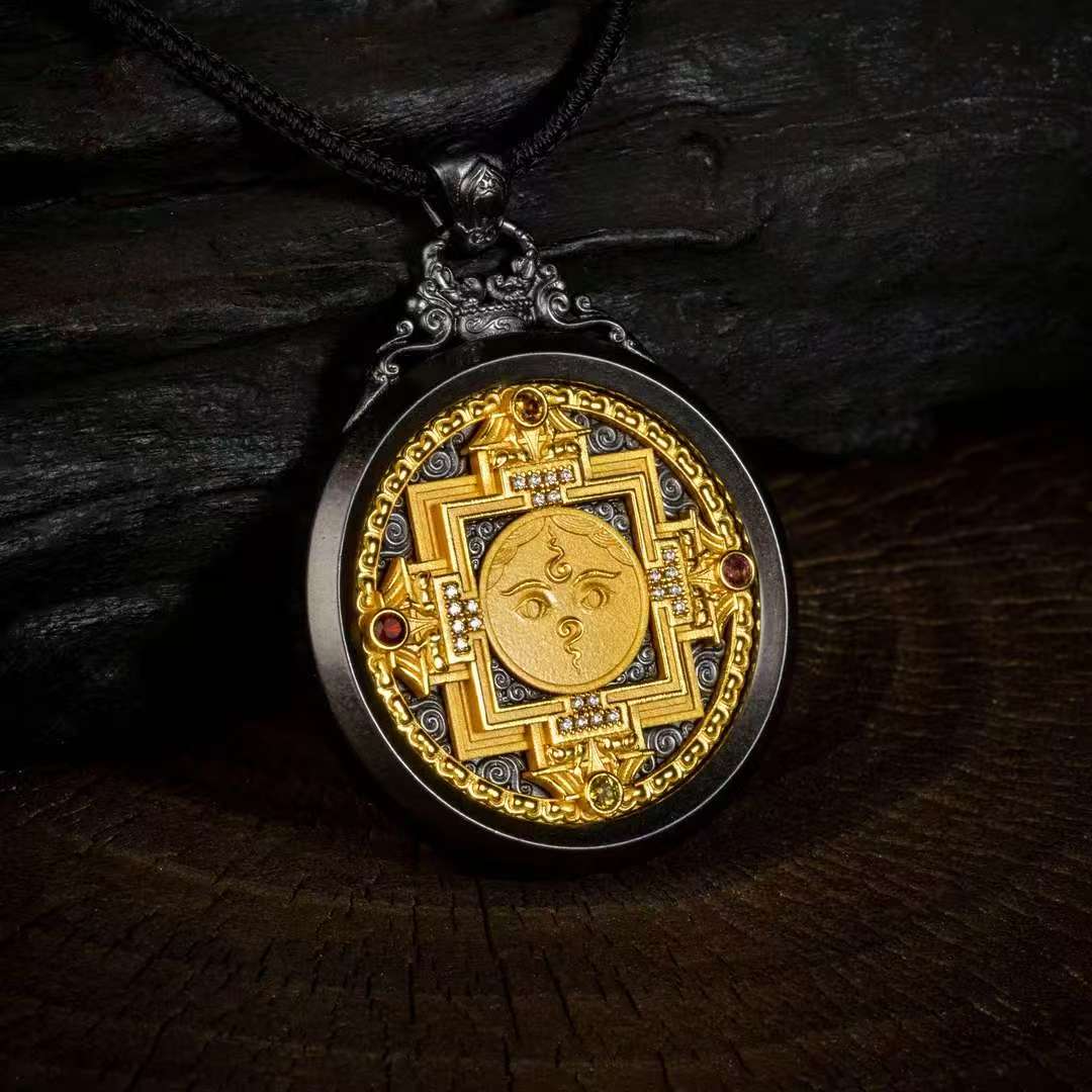 Hand-painted silver dual mandala pendant inspired by Tibetan Buddhist jewelry culture, symbolizing balance and spiritual harmony.