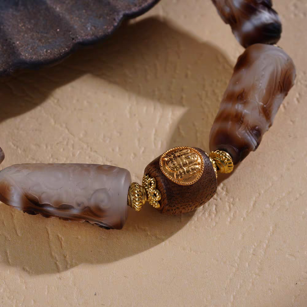 Handmade Marici Carved Beads Bracelet, inspired by Tibetan Buddhist Jewelry Culture, promotes luck, protection, and spiritual balance.”
