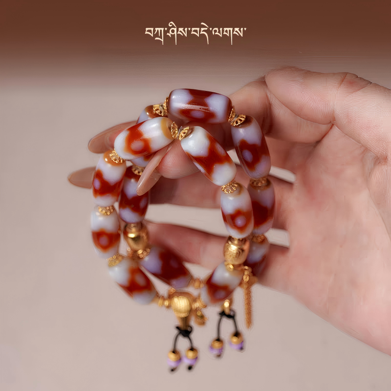 Handmade Tibetan Buddhist Dzi bead bracelet suitable for men and women, reflecting authentic Tibetan jewelry culture and artisan craftsmanship.
