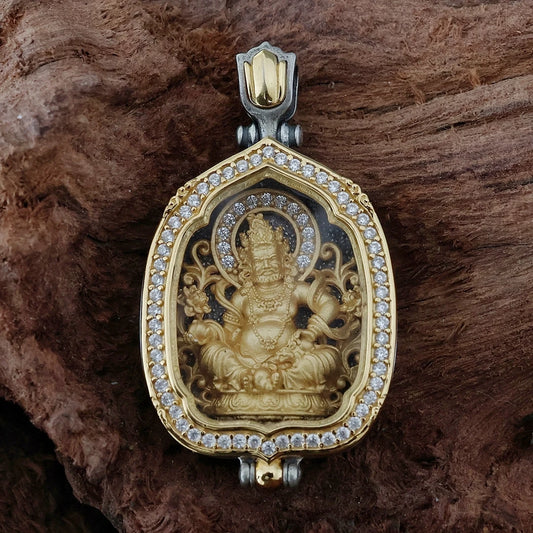 Hand-painted gilded silver Yellow Jambhala and Ksitigarbha pendant inspired by Tibetan Buddhist jewelry culture.