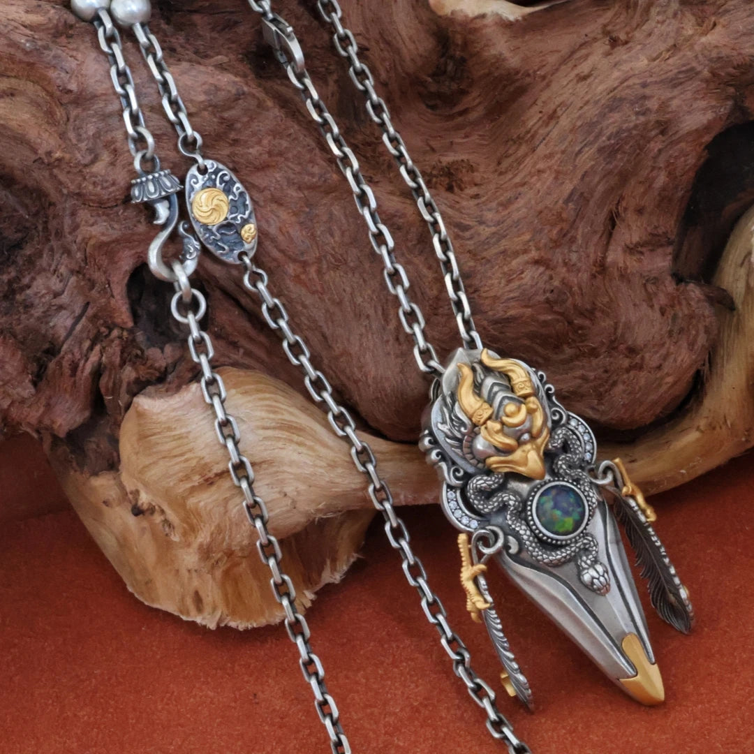 3D carved Garuda feather pendant necklace representing luck, movement, and spiritual power