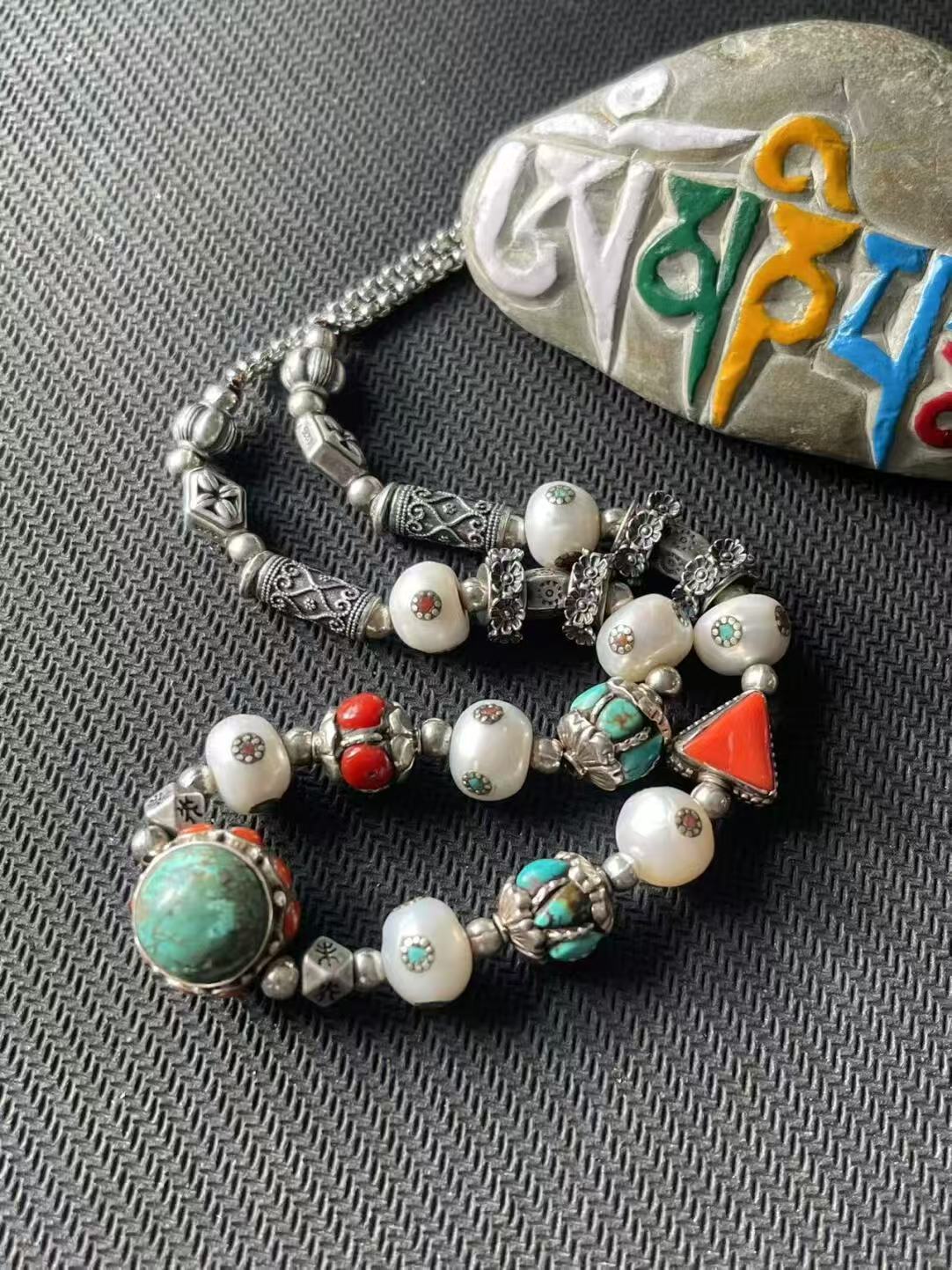 perfect fusion of Tibetan Buddhist craftsmanship and fashionable design, with multi-treasure inlays symbolizing spiritual wealth and prosperity.