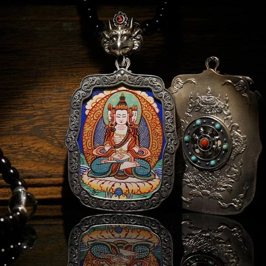 Silver zodiac guardian pendant with Regong Thangka painting from Tibetan Buddhist jewelry culture, handcrafted jewelry art.
