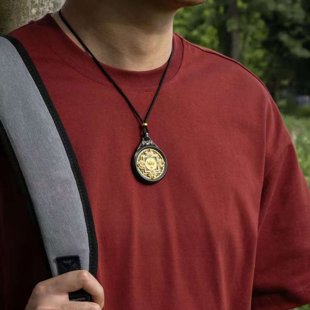 Sacred silver dual mandala pendant representing wisdom, protection, and inner balance in Tibetan Buddhism.