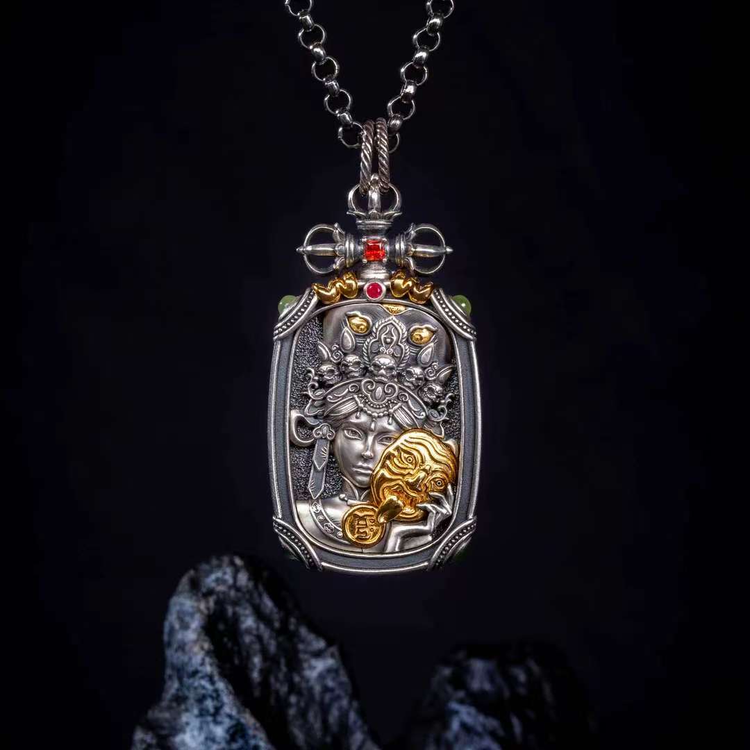 Silver Ten Auspicious Emblems pendant from Tibetan Buddhist jewelry culture, meaningful jewelry art for spiritual balance.