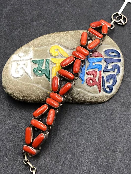 Exquisitely hand-painted red plastic bracelet, embodying Tibetan Buddhist jewelry culture with a unique design, bringing together beauty, symbolism, and craftsmanship.