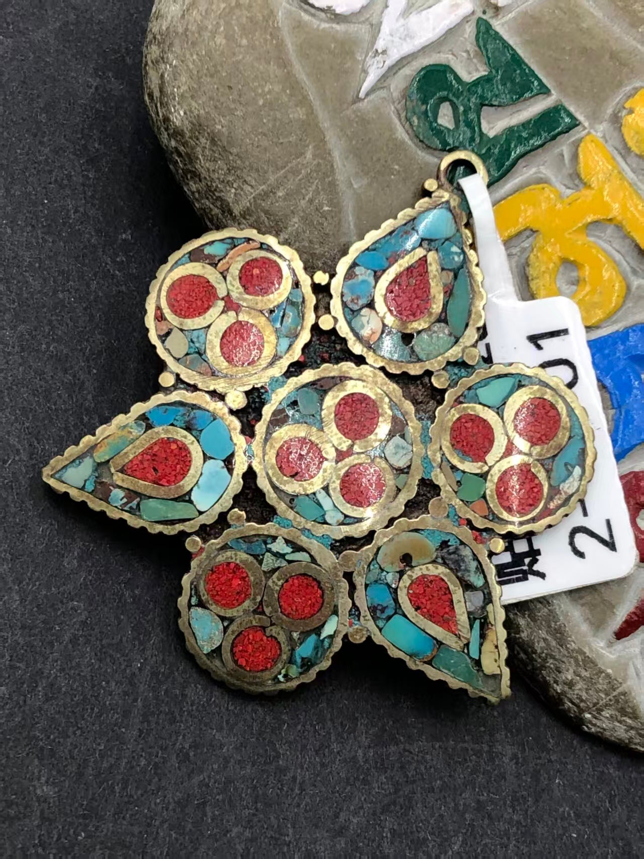 Handcrafted vintage patch pendant, showcasing Tibetan Buddhist craftsmanship. A unique, spiritual accessory that embodies cultural heritage and artistry.
