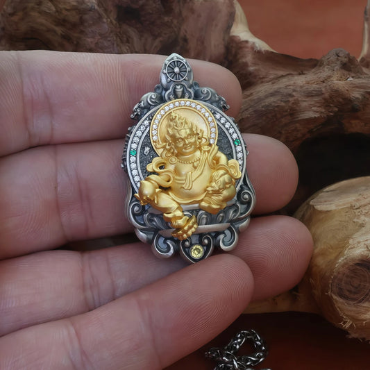 Hand-painted silver Yellow Jambhala rotating pendant inspired by Tibetan Buddhist jewelry culture, symbolizing wealth and fortune flow.