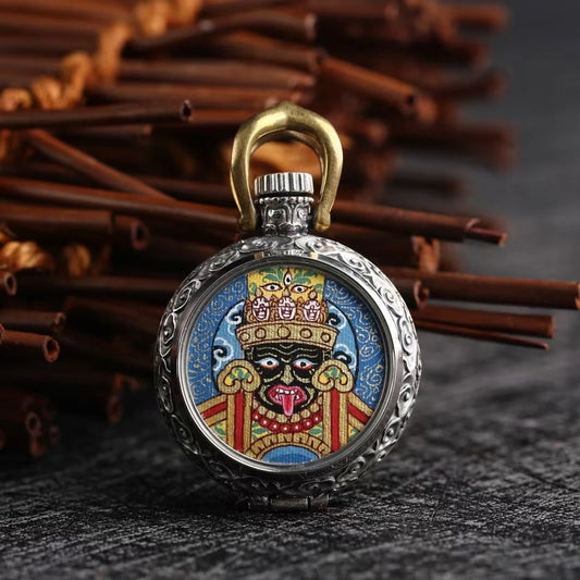 Handcrafted Zaki Lam Yellow Wealth Buddha Thangka pendant necklace, symbolizing prosperity and protection in Tibetan Buddhist Jewelry Culture