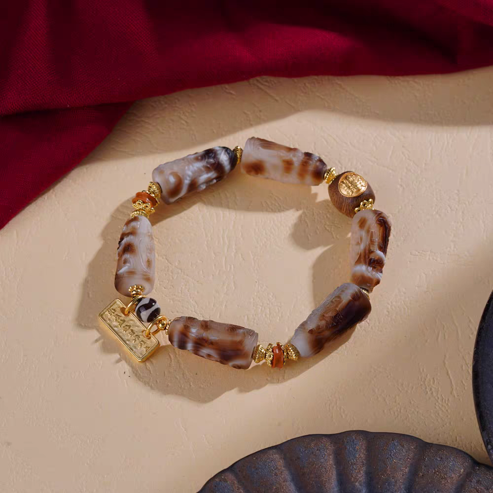 Tibetan Carved Marici Beads Wrist Mala, handcrafted bracelet, unisex spiritual accessory for meditation, peace, and positive energy.