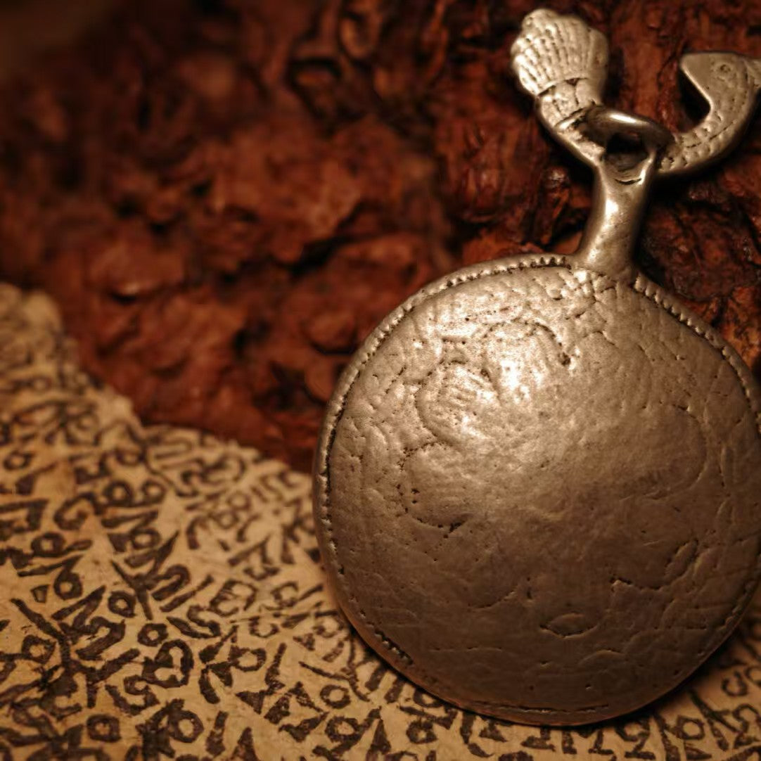 Hand-painted Peacock Wisdom King nine palace bagua pendant inspired by Tibetan Buddhist jewelry culture, symbolizing protection and harmony.