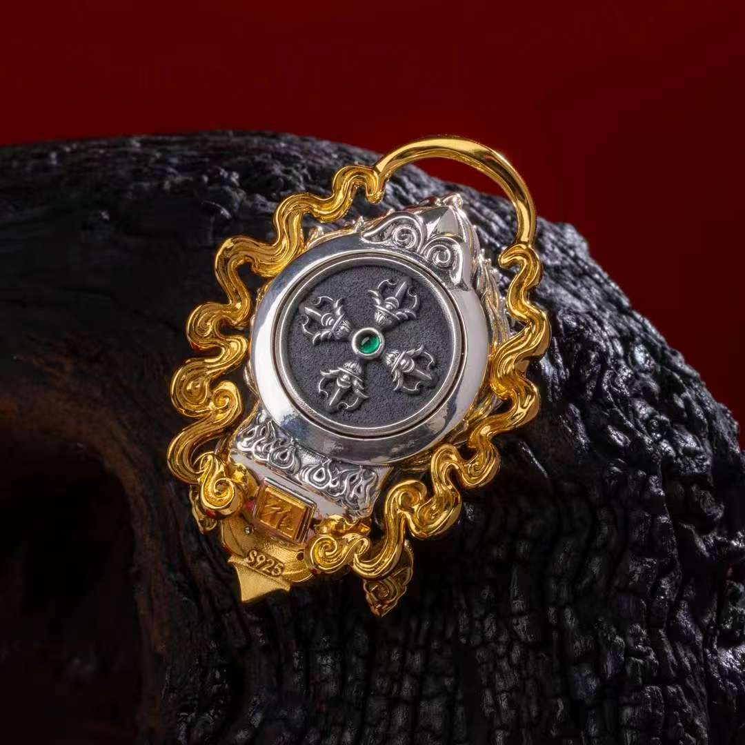 Hand-painted silver Fudo Myoo pendant inspired by Tibetan Buddhist jewelry culture, symbolizing protection and inner strength.