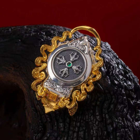 Hand-painted silver Fudo Myoo pendant inspired by Tibetan Buddhist jewelry culture, symbolizing protection and inner strength.