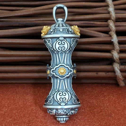 Handcrafted silver rotating Five Wealth Gods pendant inspired by Tibetan Buddhist jewelry culture, symbolizing wealth attraction and good fortune.