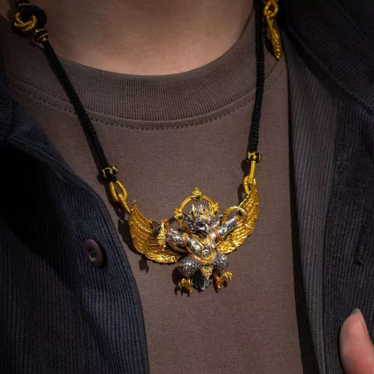 Handcrafted silver Garuda pendant inspired by Tibetan Buddhist jewelry culture, symbolizing protection and powerful spiritual energy.