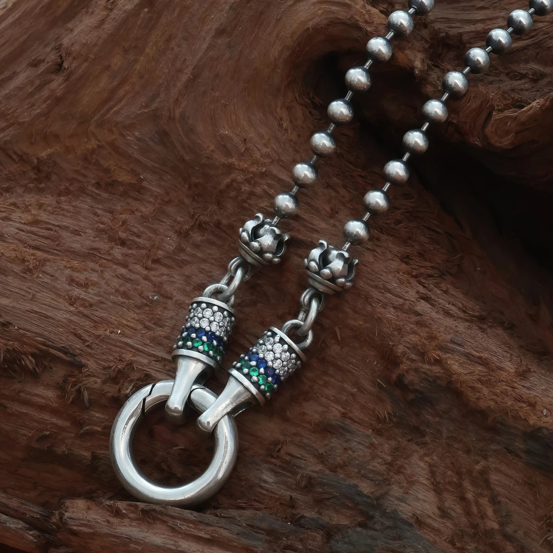 Handcrafted silver lotus thangka pendant necklace inspired by Tibetan Buddhist jewelry culture, spiritual jewelry art.