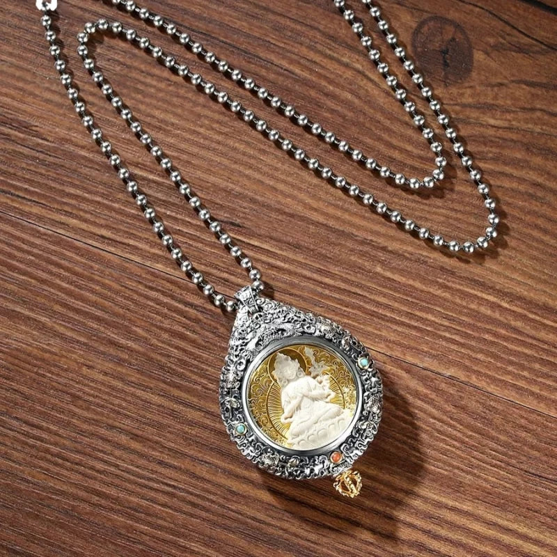 Handcrafted silver rotating nine palace Bagua pendant inspired by Tibetan Buddhist jewelry culture and sacred jewelry art.