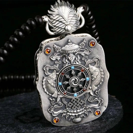Silver Yellow Jambhala guardian pendant in Tibetan Buddhist jewelry culture, sacred jewelry art for prosperity and blessings.