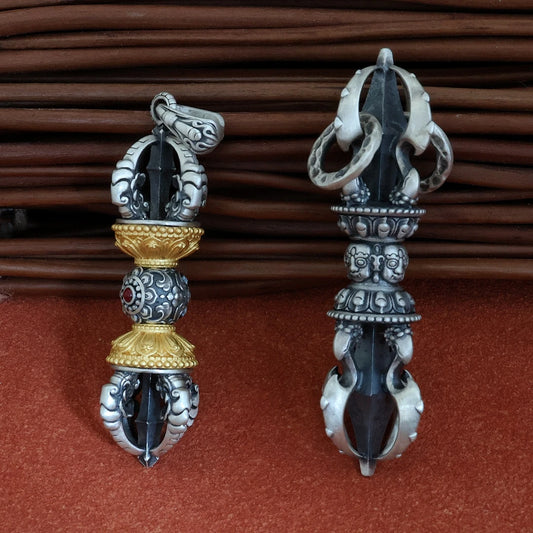 Handcrafted silver five-pronged Vajra pendant inspired by Tibetan Buddhist jewelry culture, symbolizing power and protection.