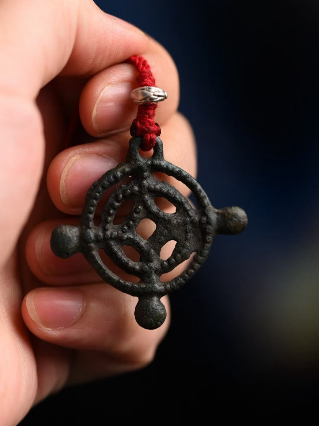 Handmade Togcha mandala pendant from Tibetan Buddhist jewelry culture, spiritual jewelry art for meditation and daily wear.