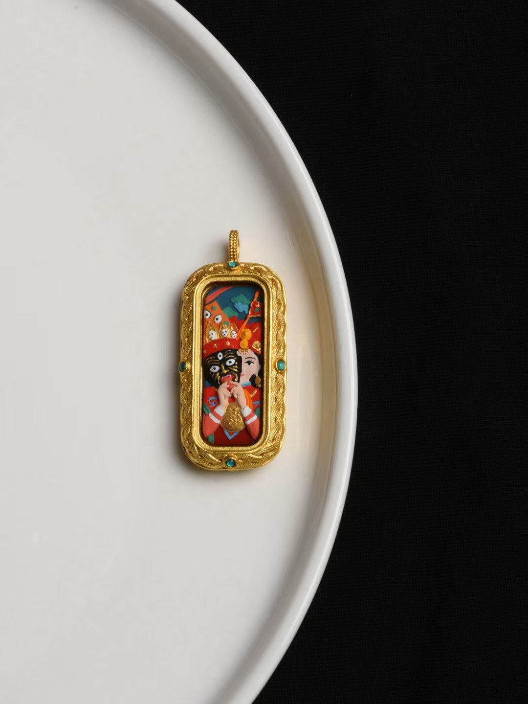 Hand-painted Zaki Lhamo thangka pendant inspired by Tibetan Buddhist jewelry culture, symbolizing wealth, protection, and blessings.