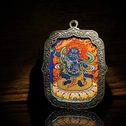 Hand-painted Regong Thangka zodiac guardian pendant inspired by Tibetan Buddhist jewelry culture, silver spiritual jewelry art.