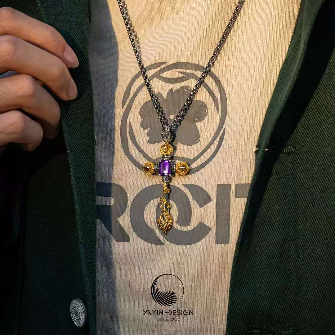 Ancient-style silver Manjushri sword pendant from Tibetan Buddhist jewelry culture, meaningful jewelry art.