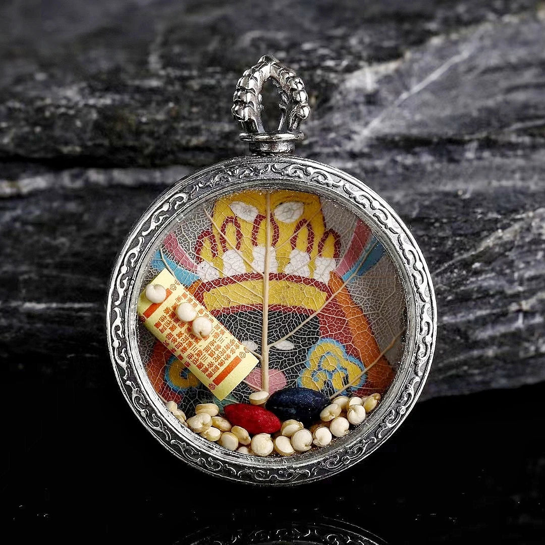 Tibetan Buddhist Jewelry Culture Zaki Lam Yellow Buddha Thangka pendant necklace with intricate Blue Bodhi Leaf details, representing wisdom and wealth