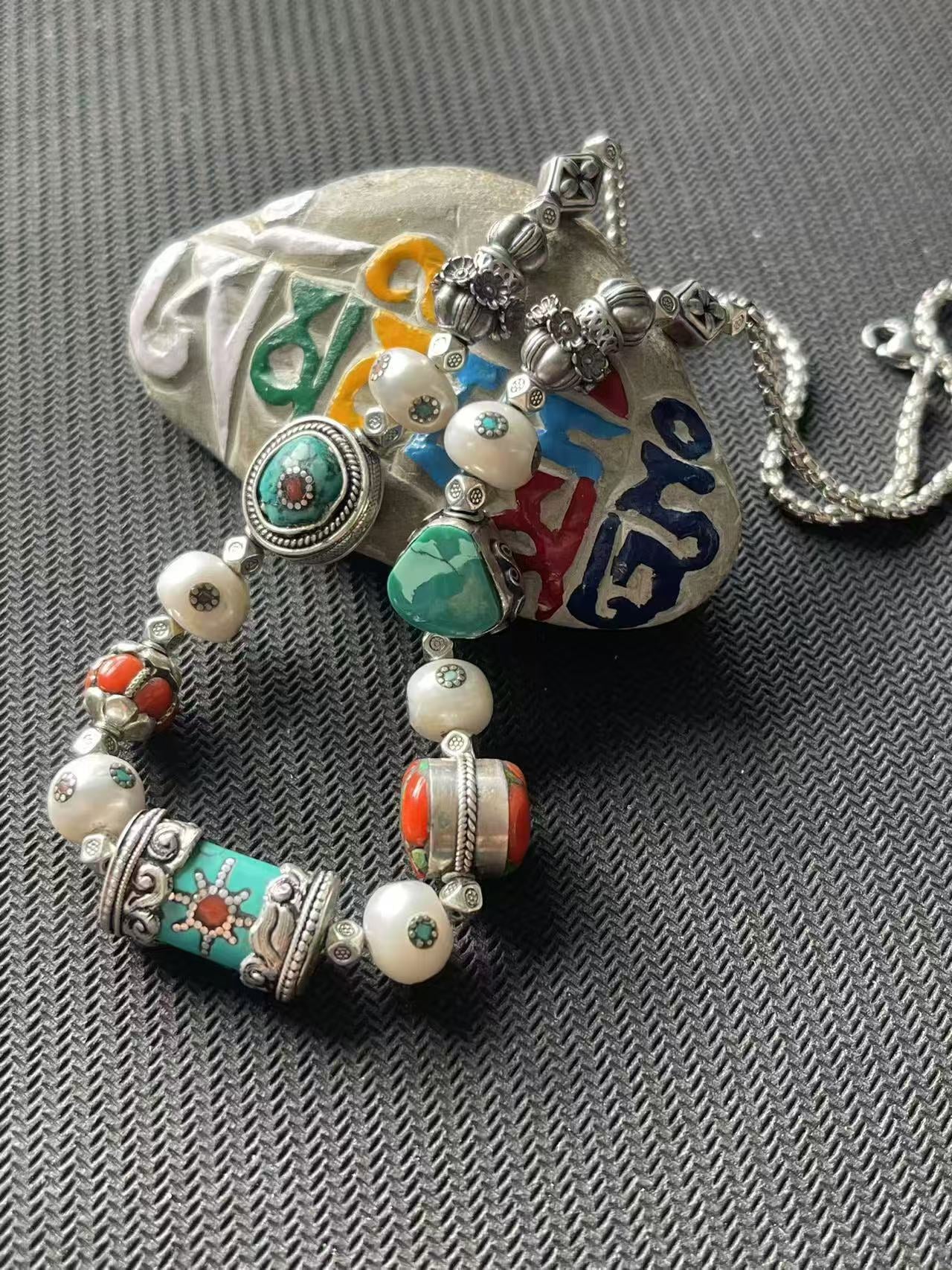 Handmade multi-treasure symmetric bracelet, embodying Tibetan Buddhist jewelry culture with its unique design, perfect for anyone seeking fashionable, spiritual jewelry.