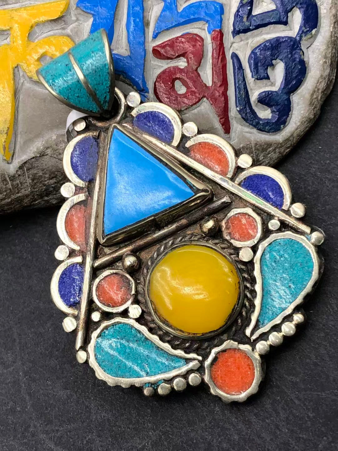 Pure handcrafted beeswax pendant infused with Tibetan Buddhist symbolism. Represents balance, strength, and spiritual clarity in every piece.