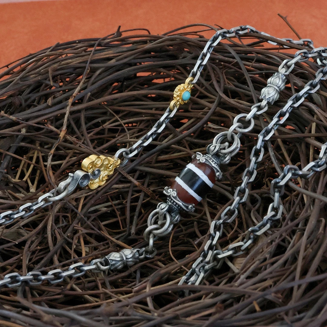 Retro silver necklace inspired by Tibetan Buddhist jewelry culture, timeless jewelry art for men and women.