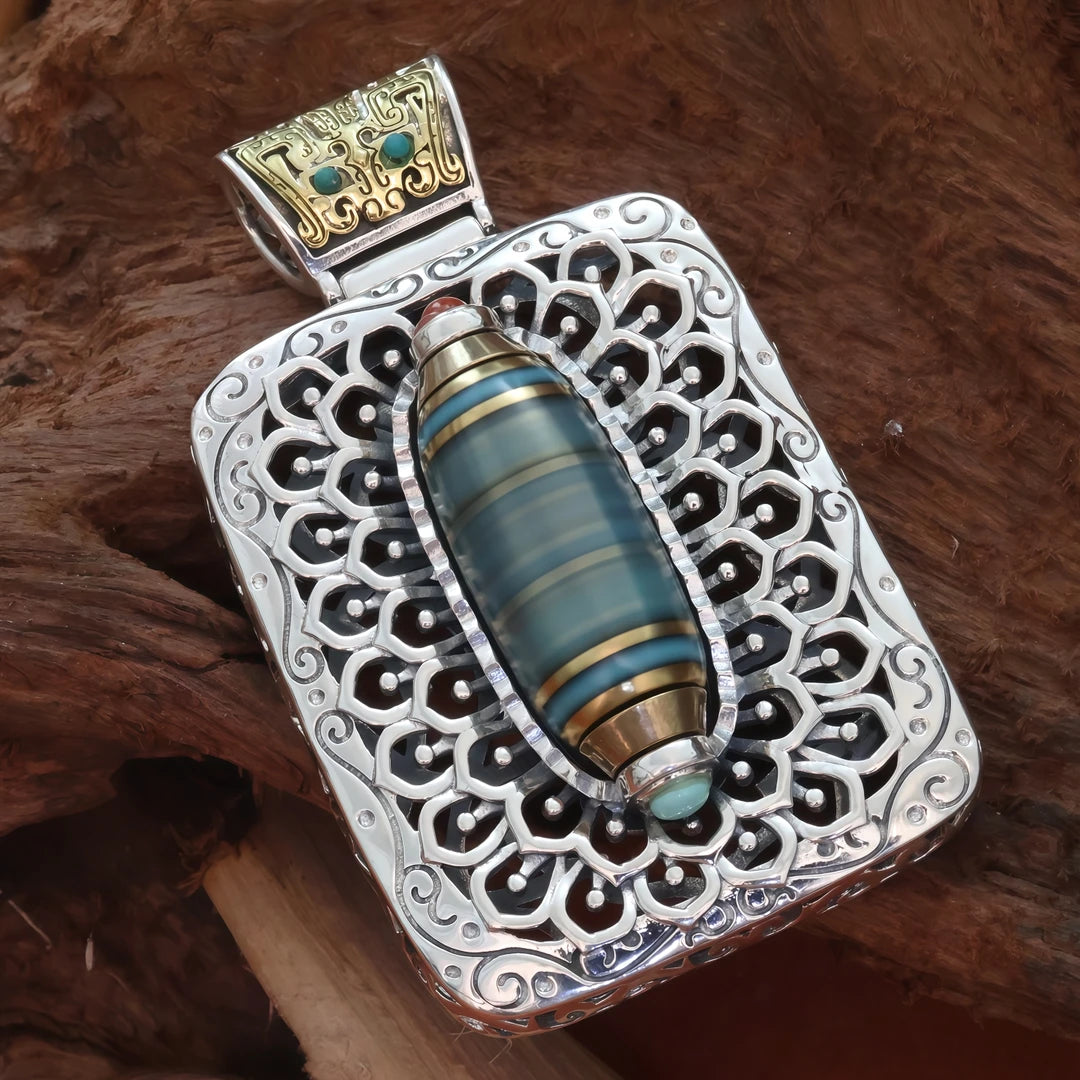 Tibetan Buddhist jewelry culture silver Taotie pendant, hand-carved jewelry art for wealth attraction and protection.