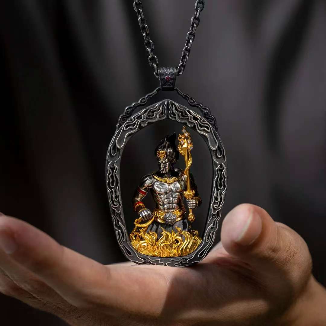 Sacred Acala Gawu Buddhist pendant representing protection, wisdom, and stability in Tibetan jewelry art.