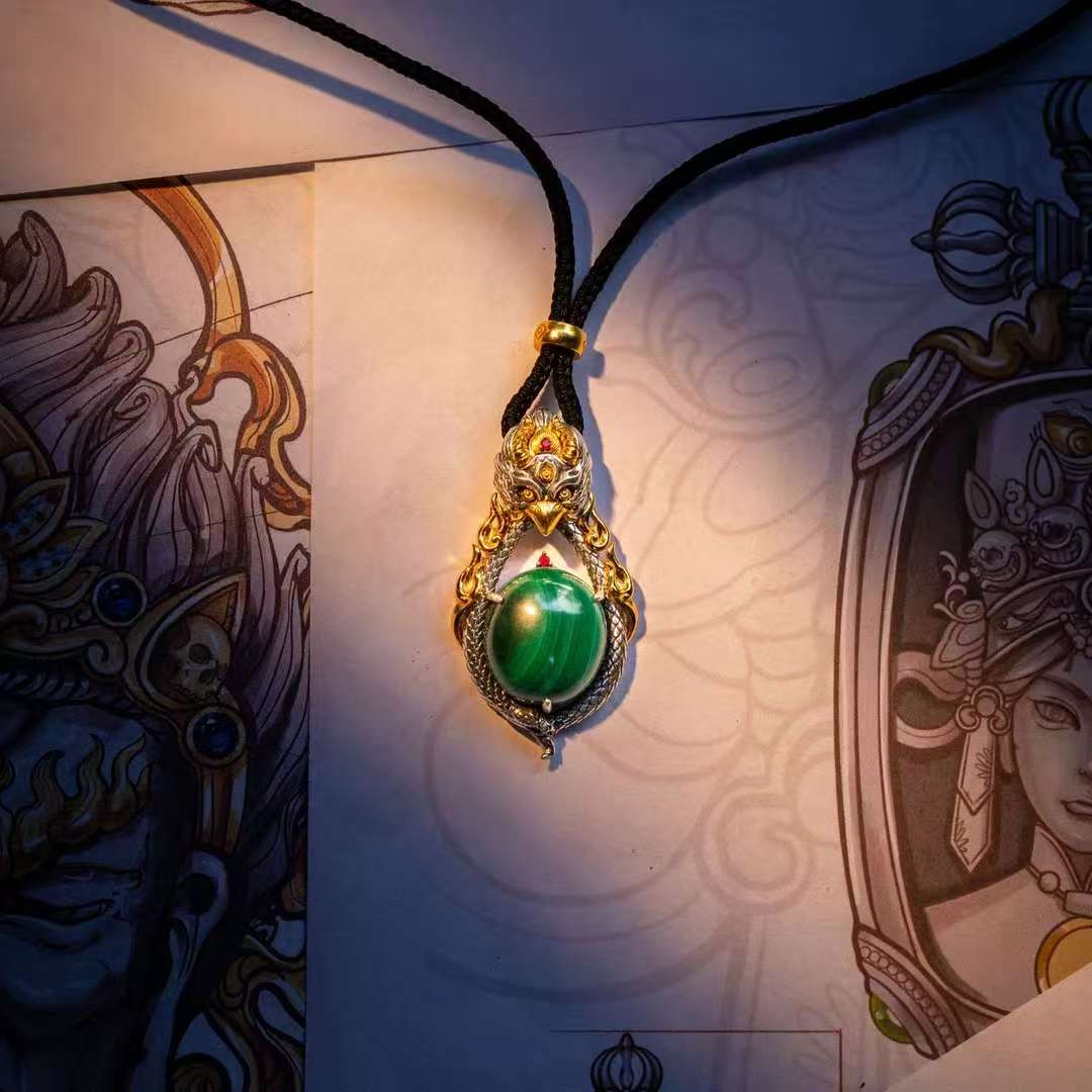 Sacred Garuda silver pendant rooted in Tibetan Buddhist jewelry culture, representing strength and protection from negative energy.