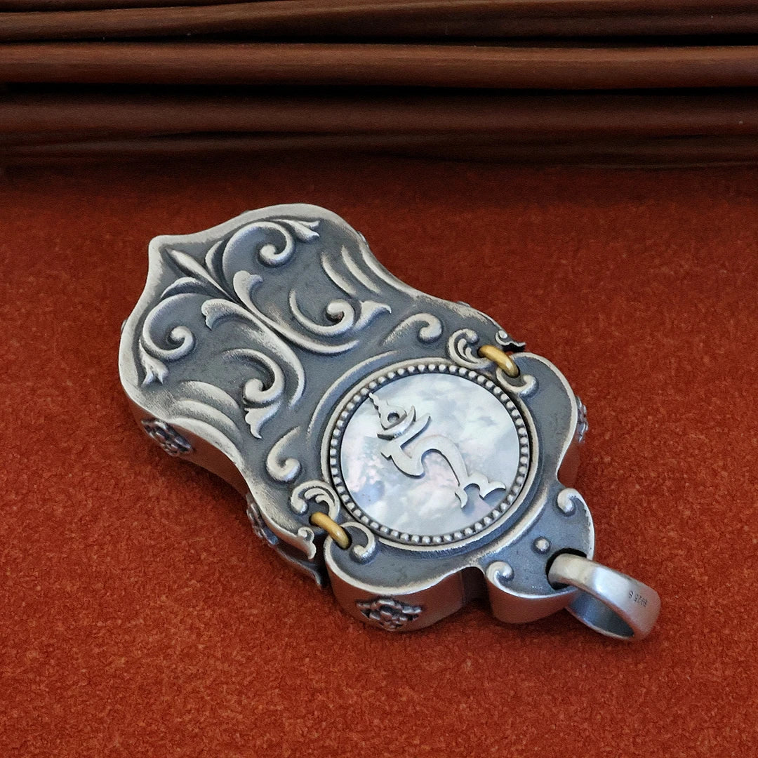 Sacred Green Tara spinning pendant necklace with inlaid carvings, offering spiritual strength and energy flow, inspired by Tibetan Buddhist Jewelry Culture