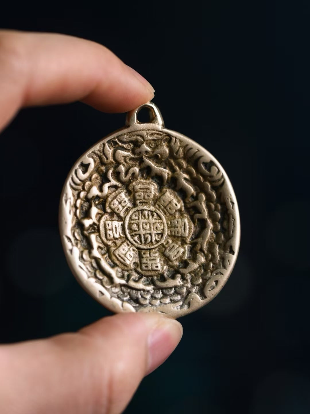 Sacred Nine Palace Bagua pendant representing Tibetan Buddhist jewelry culture and spiritual protection.