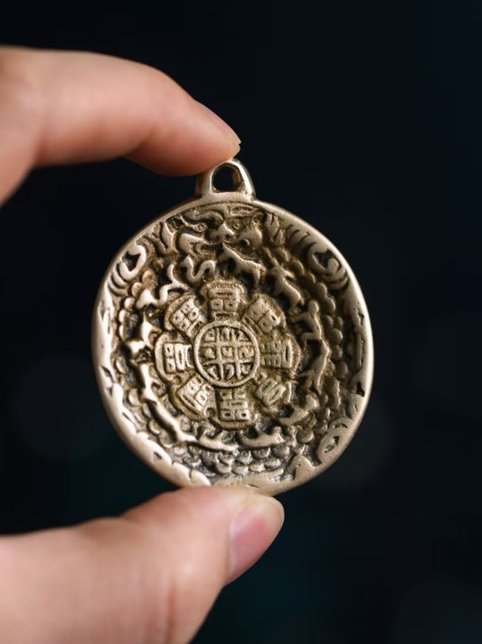 Sacred Nine Palace Bagua pendant representing Tibetan Buddhist jewelry culture and spiritual protection.
