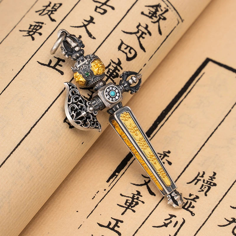 Rotating Mahakala guardian axe pendant in silver, inspired by Tibetan Buddhist jewelry culture and sacred jewelry art.