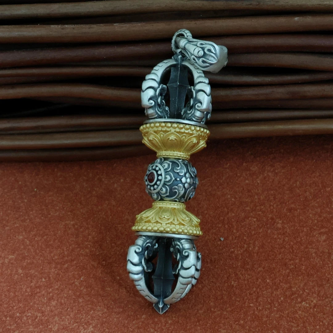 Hand-painted five-pronged Vajra pendant rooted in Tibetan Buddhist jewelry culture and spiritual practice.