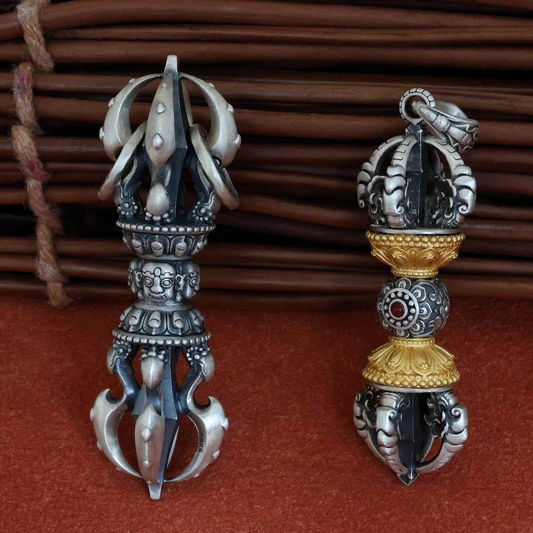 Sacred silver Vajra pendant representing strength, wisdom, and spiritual protection in Buddhist jewelry art.