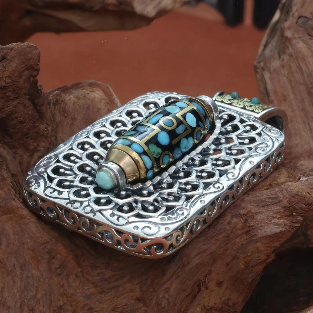 Silver Taotie square pendant representing Tibetan Buddhist jewelry culture, a symbol of power, balance, and good fortune.