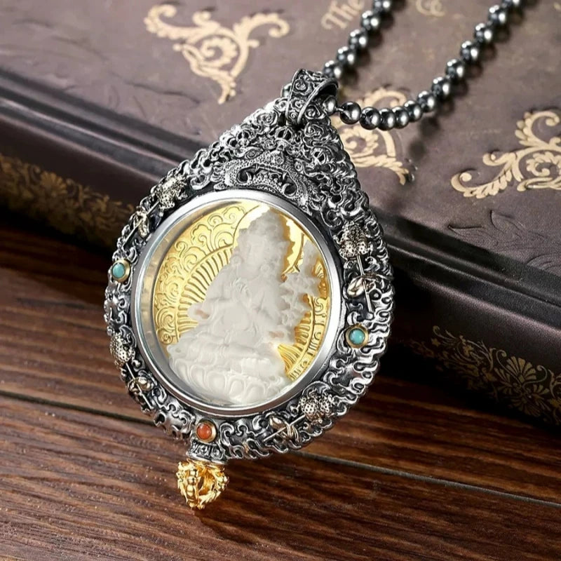 Rotating nine palace Bagua silver pendant representing Tibetan Buddhist jewelry culture and spiritual protection.